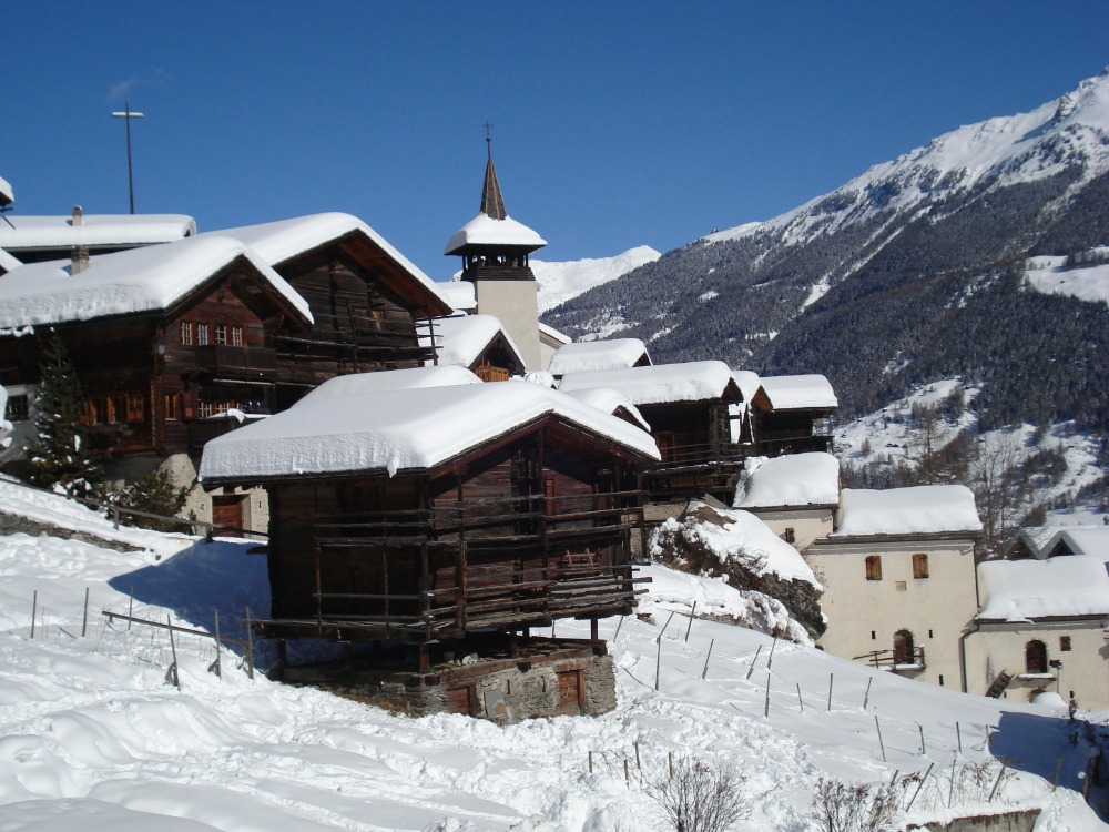 Grimentz snowy buildings